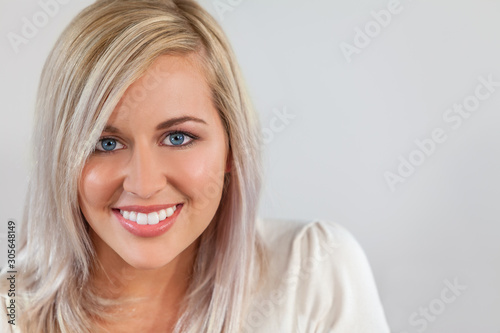 Portrait of Beautiful Blonde Girl Young Woman With Perfect Teeth