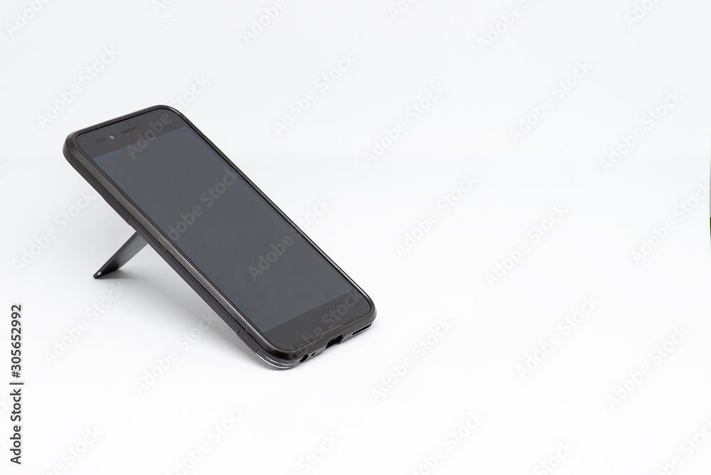 Black mobile phone on white background Black mobile phone on white background