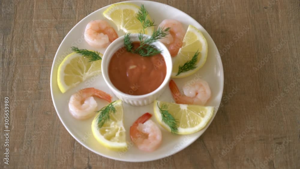 shrimp cocktail with sauce and lemon shrimp cocktail with sauce and lemon