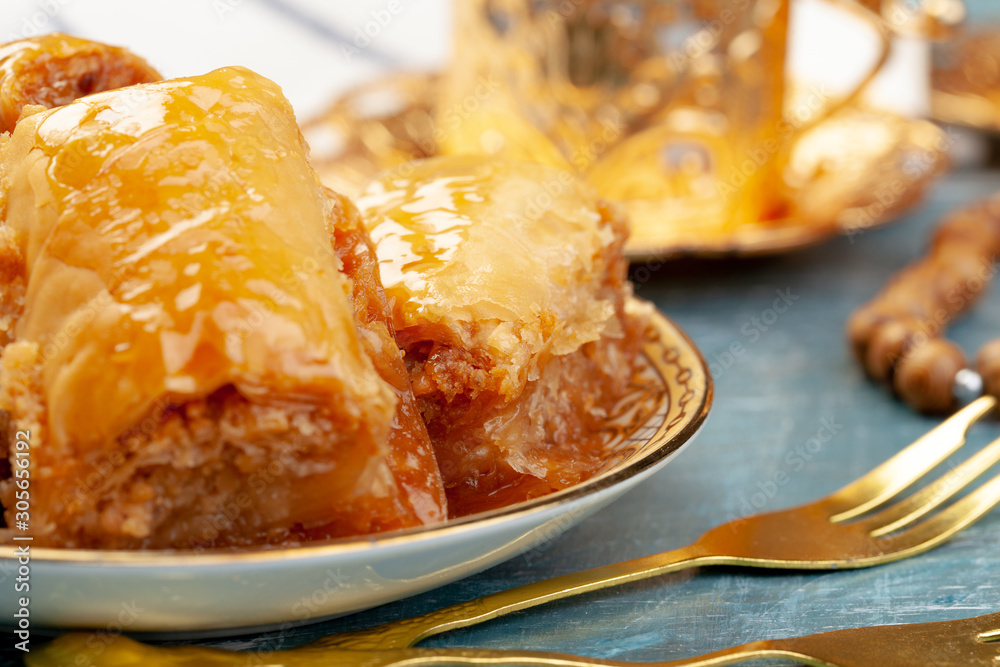 Close up photo of Delicious Turkish Baklava served on a plate Close up photo of Delicious Turkish Baklava served on a plate