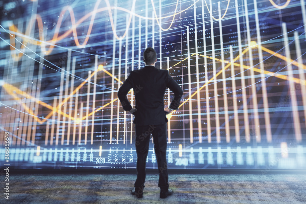 Businessman and forex graph hologram. Double exposure. Concept of financial education and analysis Businessman and forex graph hologram. Double exposure. Concept of financial education and analysis