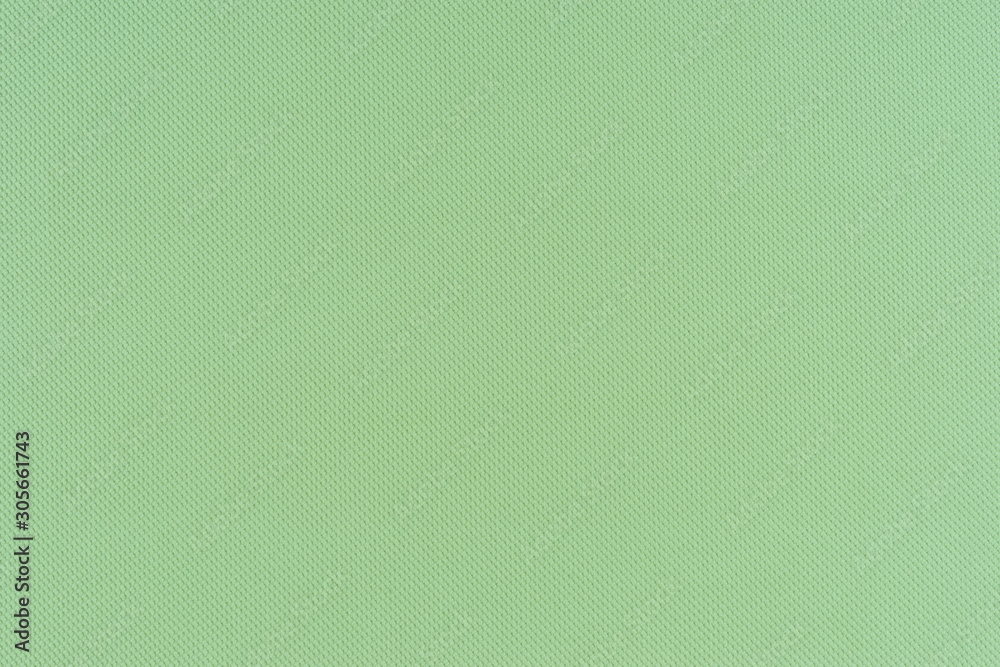 Closeup green fabric texture background Closeup green fabric texture background