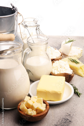 Foto Different  healthy dairy products on rustic background with milk, cheese, butter