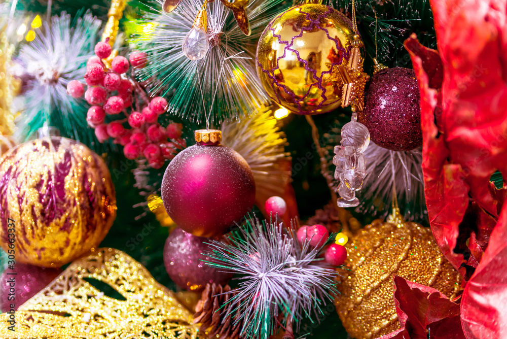 Fototapeta premium beautiful Christmas toys on the Christmas tree. festive Christmas decorations. colorful Christmas balls