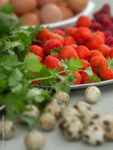 Strawberries and raspberries. Fruits. Quaileggs photo