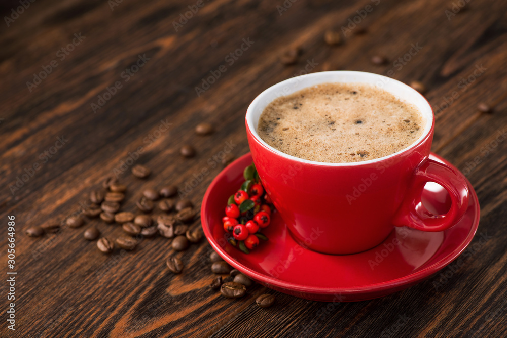 Delicious brazilian arabica coffee in red cup with berries Delicious brazilian arabica coffee in red cup with berries