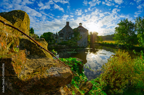 Sunrise at the castle ruin Scotney Castle in southern England.