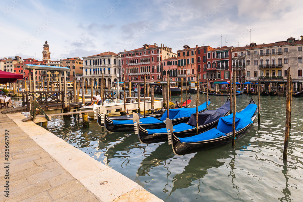 Grand canal of Venice city with boats and traditional colorful architecture, Italy