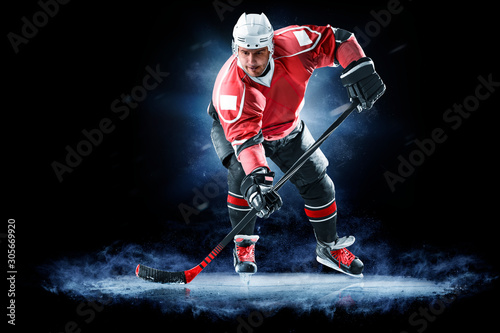 ice hockey player isolated on black background © 103tnn