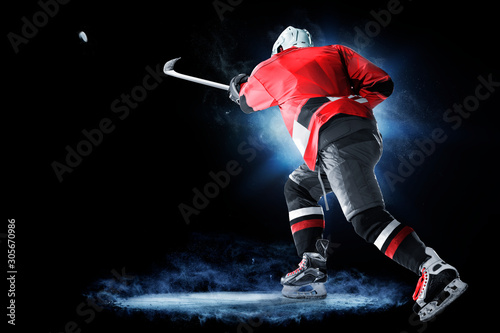 ice hockey player isolated on black background © 103tnn