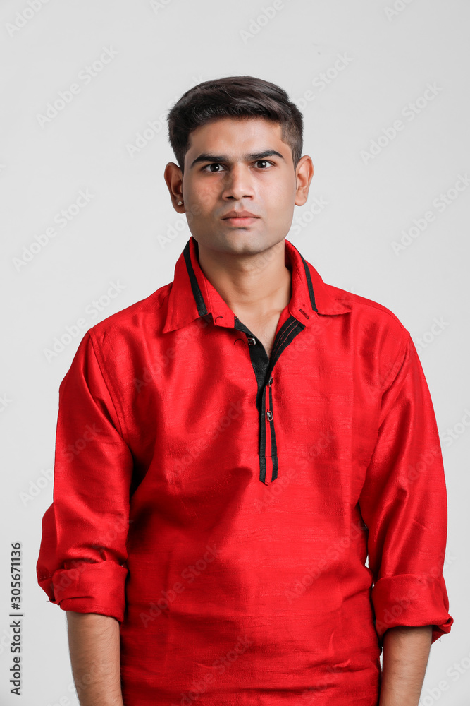Indian / Asian man in red shirt and showing multi pal expression over white background Indian / Asian man in red shirt and showing multi pal expression over white background