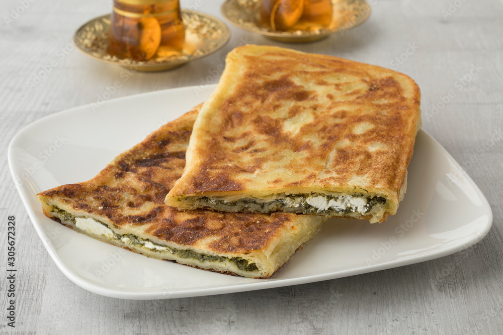 Traditiona Turkish pancake stuffed with spinach and feta cheese