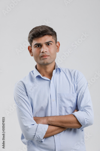 young indian man Standing over white background and showing multi pal expression  © Niks Ads