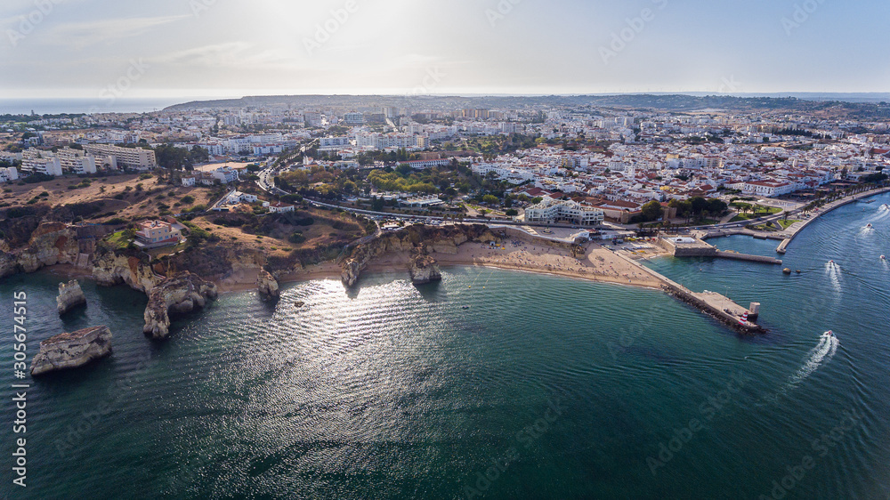 Aerial. Beautiful views of beaches of Lagos Town, from the sky. Portugal