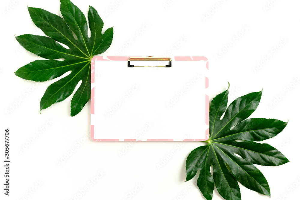 Clipboard mockup with exotic green leaves Clipboard mockup with exotic green leaves