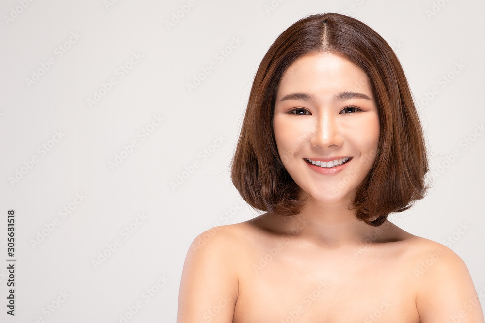 Beautiful Asian woman with short hairs looking at camera smile with clean and fresh skin Happiness and cheerful with positive emotional,isolated on gray background,Beauty and Cosmetics Concept Beautiful Asian woman with short hairs looking at camera smile with clean and fresh skin Happiness and cheerful with positive emotional,isolated on gray background,Beauty and Cosmetics Concept
