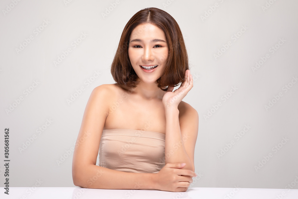 Beautiful Asian woman with short hairs looking at camera smile with clean and fresh skin Happiness and cheerful with positive emotional,isolated on gray background,Beauty and Cosmetics Concept Beautiful Asian woman with short hairs looking at camera smile with clean and fresh skin Happiness and cheerful with positive emotional,isolated on gray background,Beauty and Cosmetics Concept