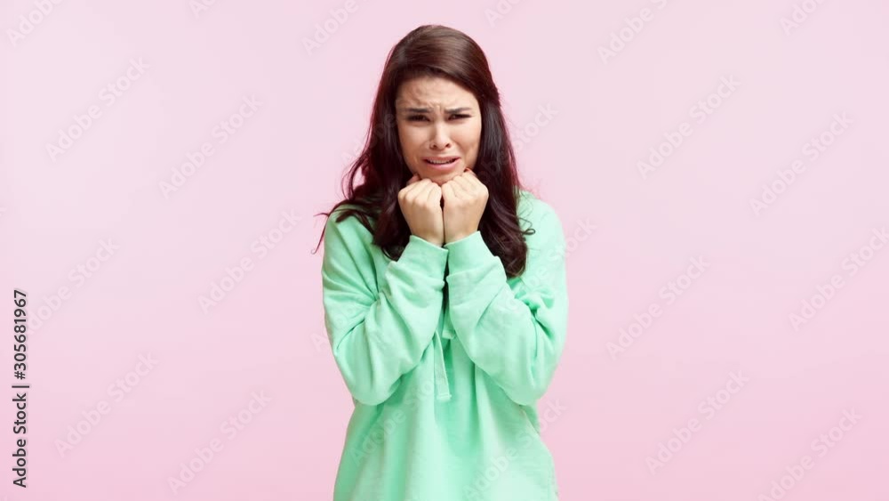 offended girl crying isolated on pink offended girl crying isolated on pink