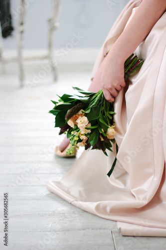 Woman in beautiful dress ho...