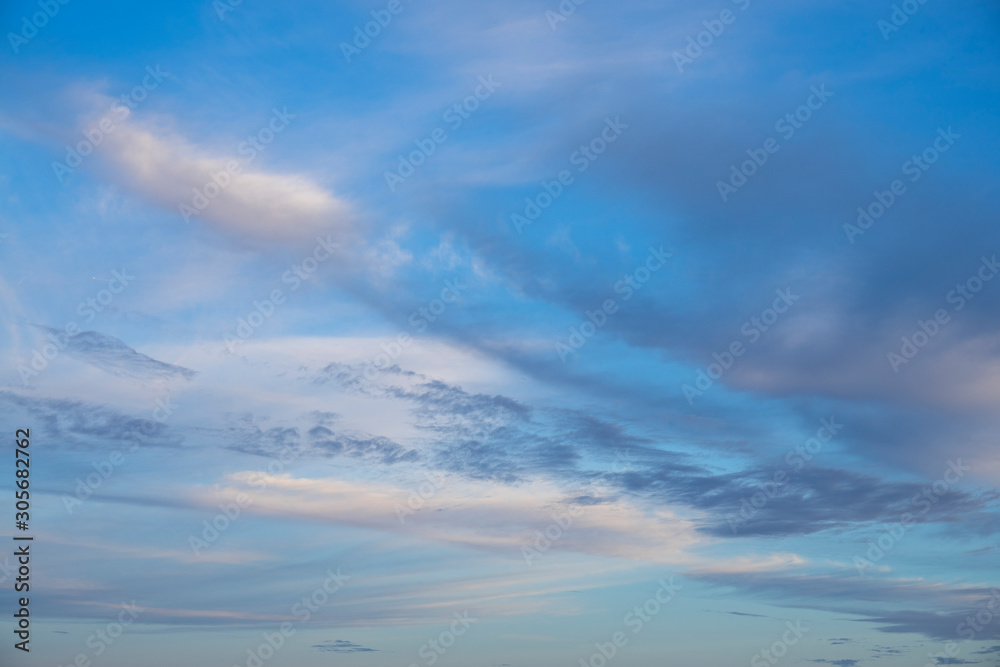 Fototapeta premium white and grey clouds in a blue sky