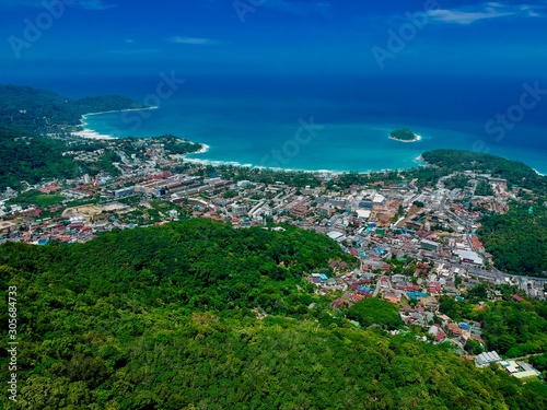 Drone panorama Aerial Views of Big Buddha Phuket Thailand kata and karon beach in background turquoise waters 