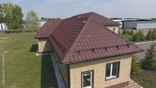 Wallpaper Mural Modern roof made of metal. House with a new roof made of metal. Corrugated metal roof and metal roofing. Torontodigital.ca