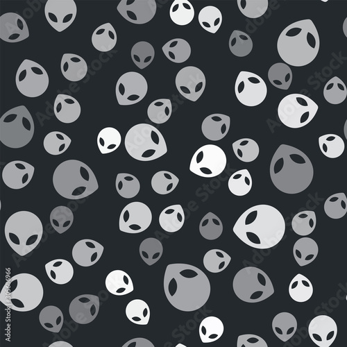 Grey Alien icon isolated seamless pattern on black background. Extraterrestrial alien face or head symbol. Vector Illustration