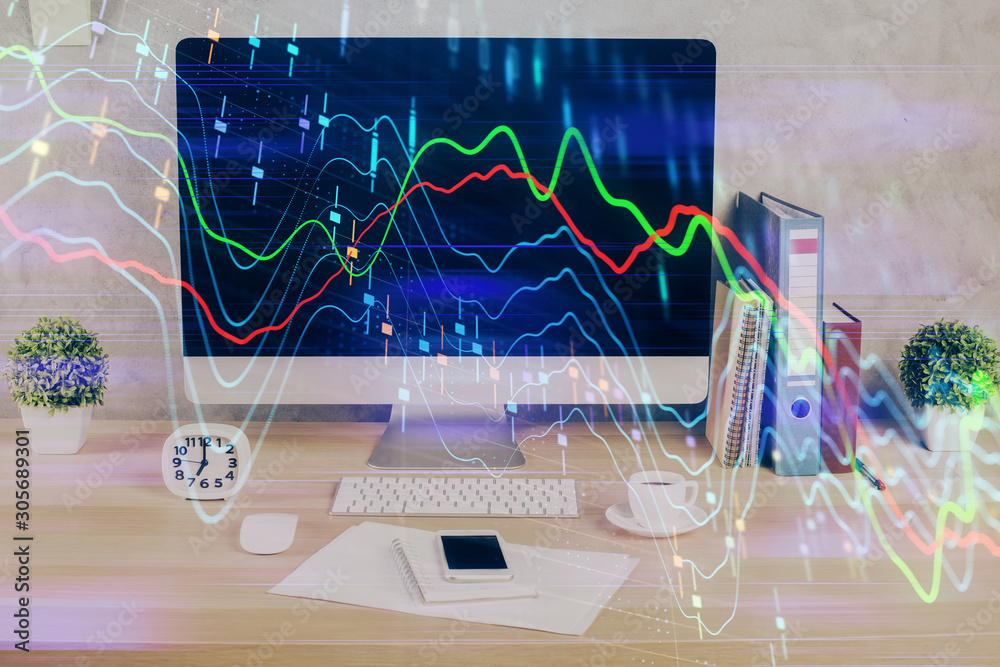 Forex graph hologram on table with computer background. Double exposure. Concept of financial markets. Forex graph hologram on table with computer background. Double exposure. Concept of financial markets.
