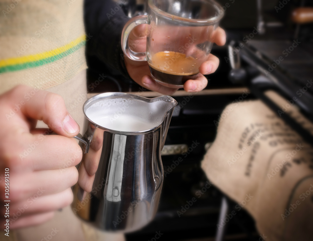 Making coffee in coffeeshop or cafe closeup