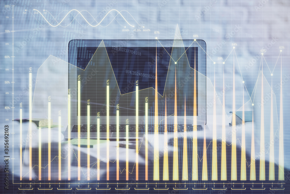 Financial market graph hologram and personal computer on background. Double exposure. Concept of forex. Financial market graph hologram and personal computer on background. Double exposure. Concept of forex.