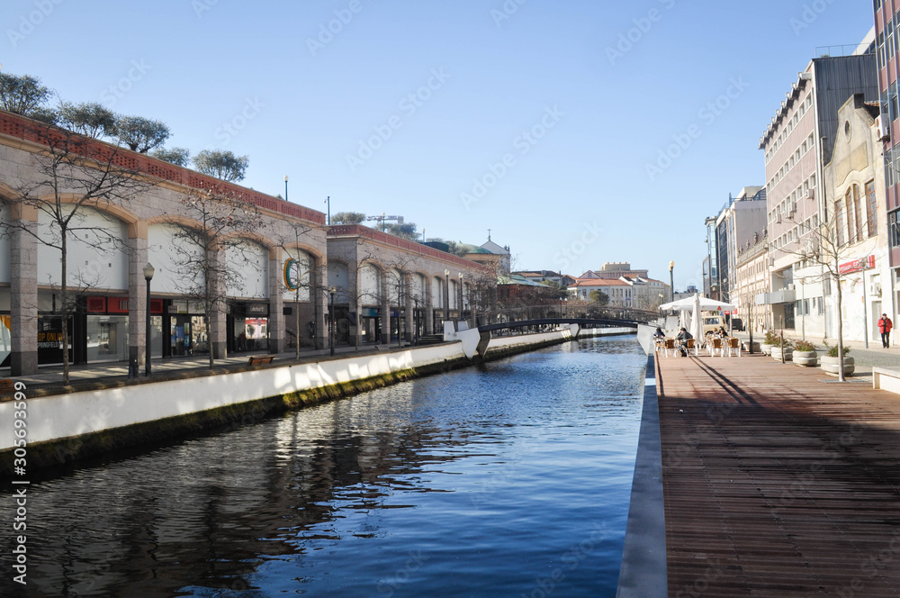 A water channel, a river in the city, between the houses. Aveiro. Portugal. Europe.