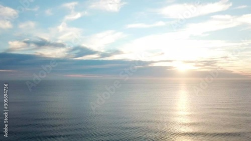 Wallpaper Mural Drone Panning Above A Coastal Beach With White Sandy Shore At Sunrise Torontodigital.ca