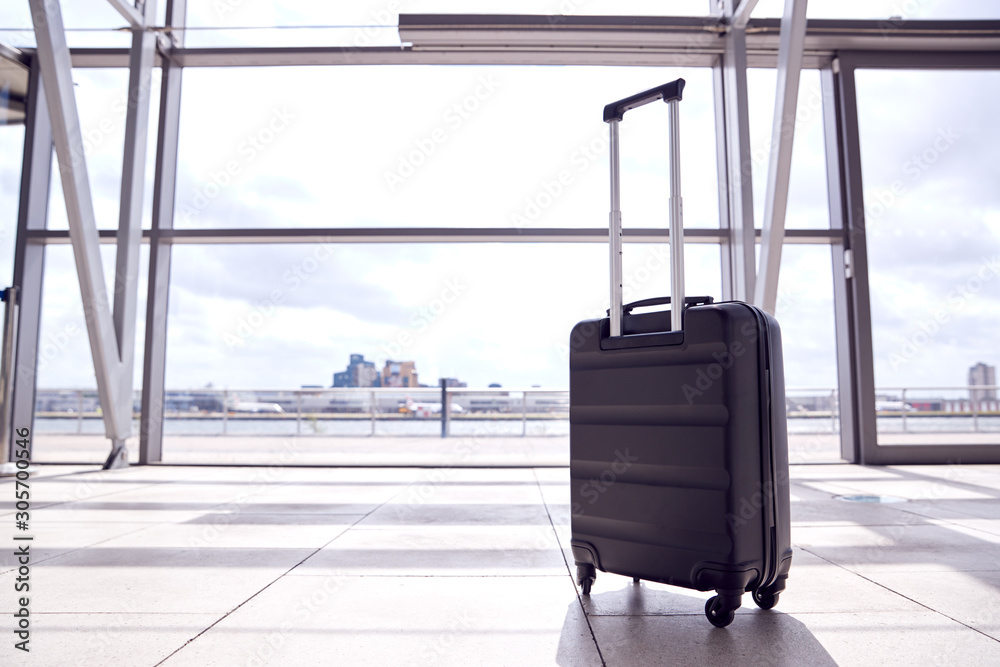 Unattended Suitcase Posing Security Threat In Airport Building