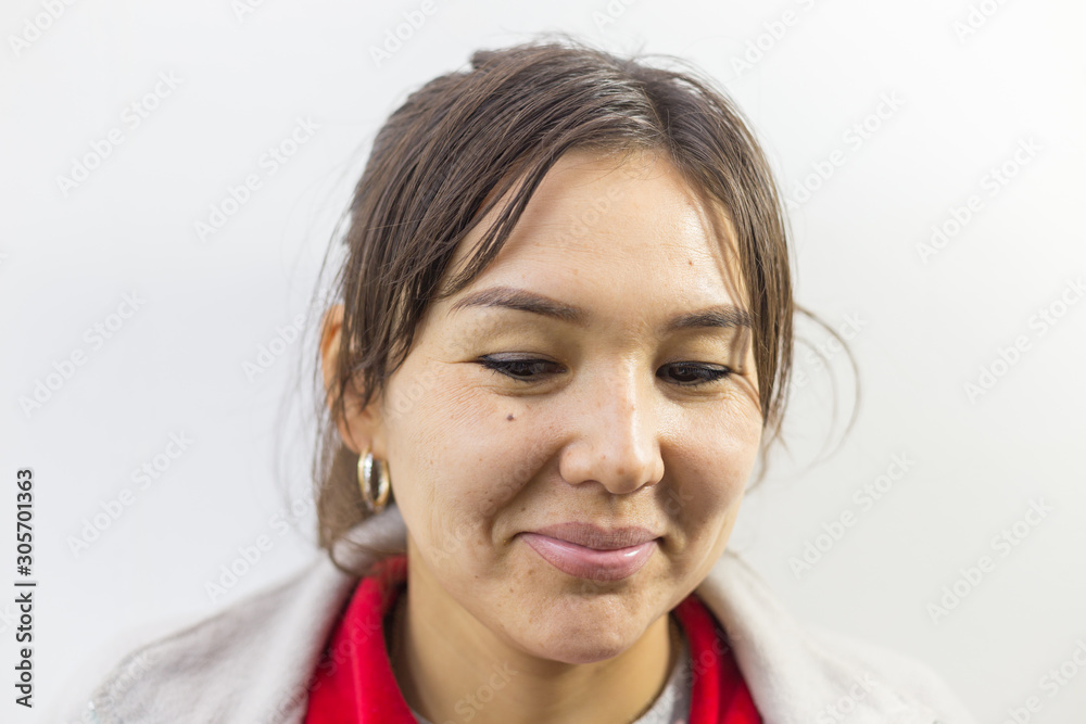 Charming brunette is not happy with fragile hair, on a white background. Charming brunette is not happy with fragile hair, on a white background.