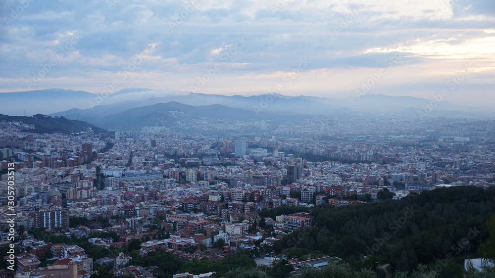 View of the stone city, dawn over Barcelona.