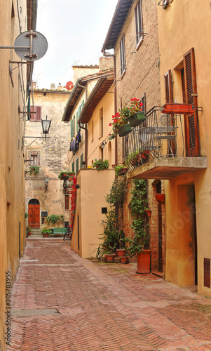 Fototapeta Naklejka Na Ścianę i Meble -  Beautiful Italian street of  small old provincial town