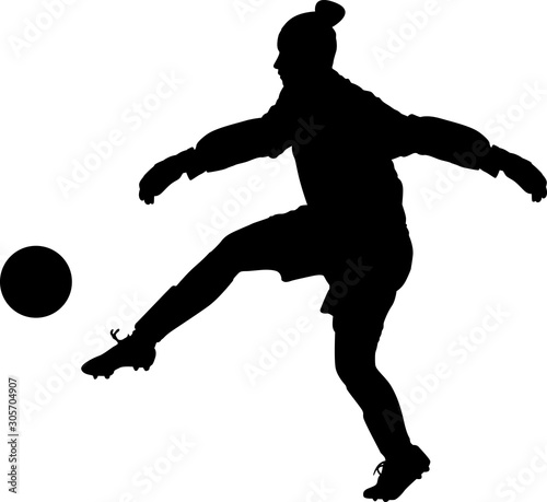 soccer goalkeeper girl hits the ball. football goalkeeper woman