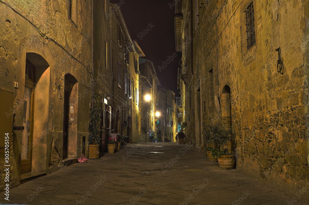 Obraz premium Beautiful Italian street of small old provincial town
