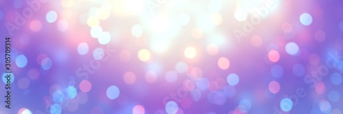 Golden glow and shining confetti on violet blue yellow iridescent banner. Empty festive background. Defocus glitter template. Abstract bokeh pattern. Blurry texture. Magical winter holiday style.
