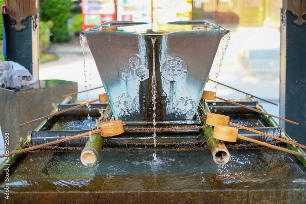 Chozusha or Holy water in wash hand stone basin for people washing ...