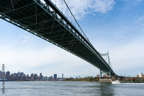 Fototapeta Naklejka Na Ścianę i Meble -  Below the Triborough Bridge connecting Astoria Queens New York to Wards and Randall's Island over the East River