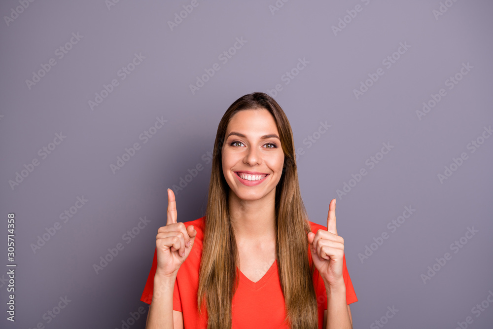 Portrait of positive cool girl promoter point index finger up copyspace look sales demonstrate ads promotion wear modern clothes isolated over grey color background Portrait of positive cool girl promoter point index finger up copyspace look sales demonstrate ads promotion wear modern clothes isolated over grey color background