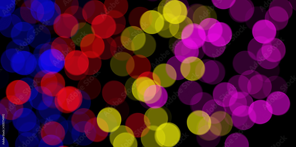 Colorful festive bokeh. Bright lights. Merry Christmas and happy New year. Background.