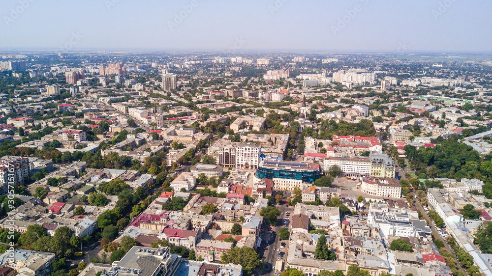 Aerial view to Odessa, roofs, port and sea from above