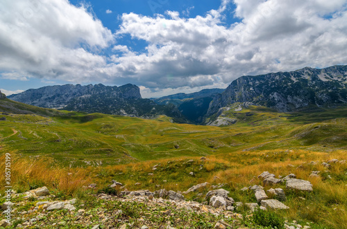 Summer mountaine landscape with cloudy sky. Mountain scenery, National park Durmitor, Zabljak, Montenegro