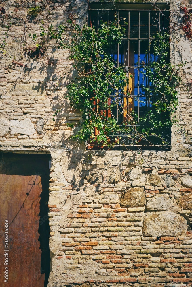 Facade of the ancient house in Spain 