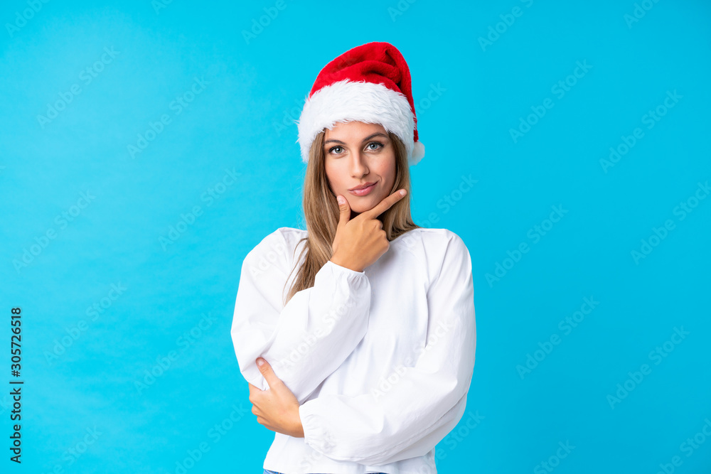 Girl with christmas hat over isolated background laughing Girl with christmas hat over isolated background laughing