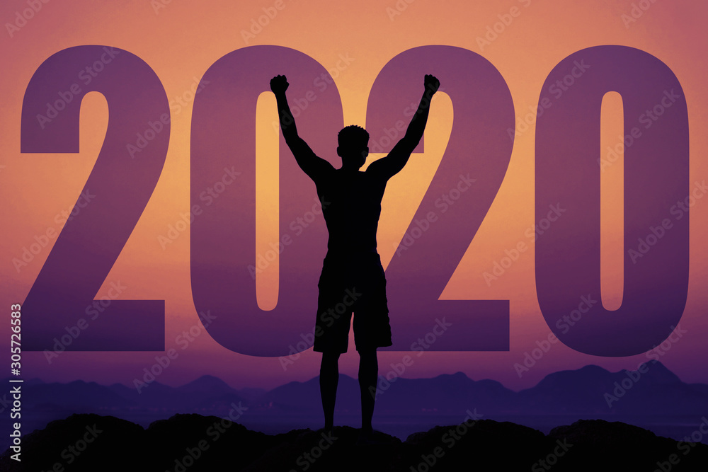 Cheering man silhouette with big new year 2020 and sunset Cheering man silhouette with big new year 2020 and sunset