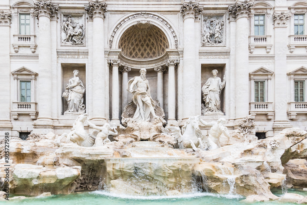 Fountai of Trevi by Nicola Salvi in the Trevi district in Rome. The largest Baroque fountain in the city and one of the most famous ones in the world. Ca 3000 Euros are thrown into the water every day