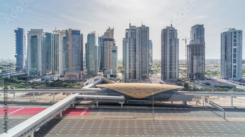 Aerial top view to Sheikh Zayed road from Dubai Marina with JLT skyscrapers timelapse during all day, Dubai. © neiezhmakov